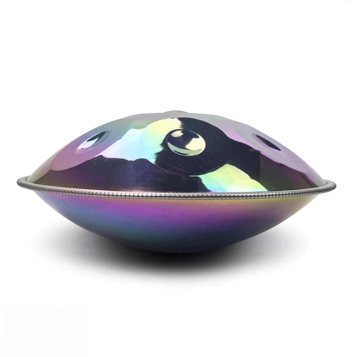 Handpan Harmonie vu de profil, reflets irisés violets - KOVAPAN