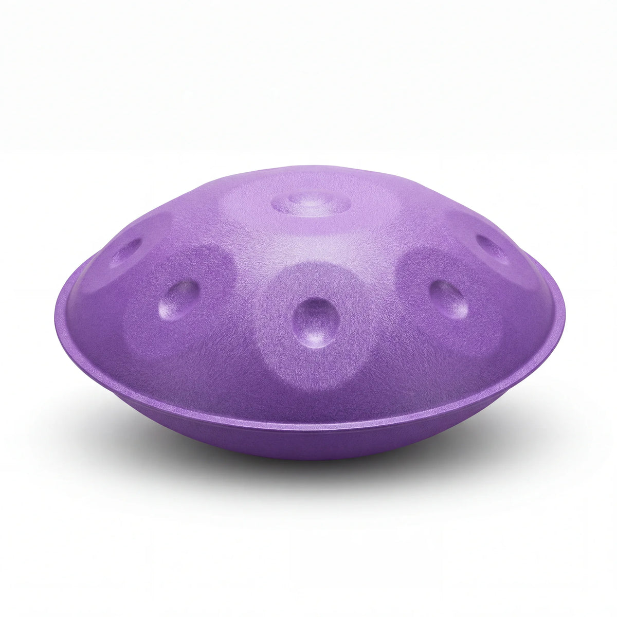 Handpan violet métallisé – vue de profil forme lenticulaire fond blanc – Kovapan