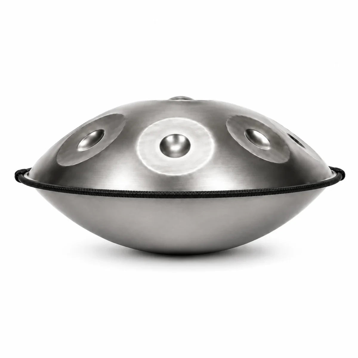 Mini handpan GRAINE 9 notes argenté, vue de profil sur fond blanc – Kovapan