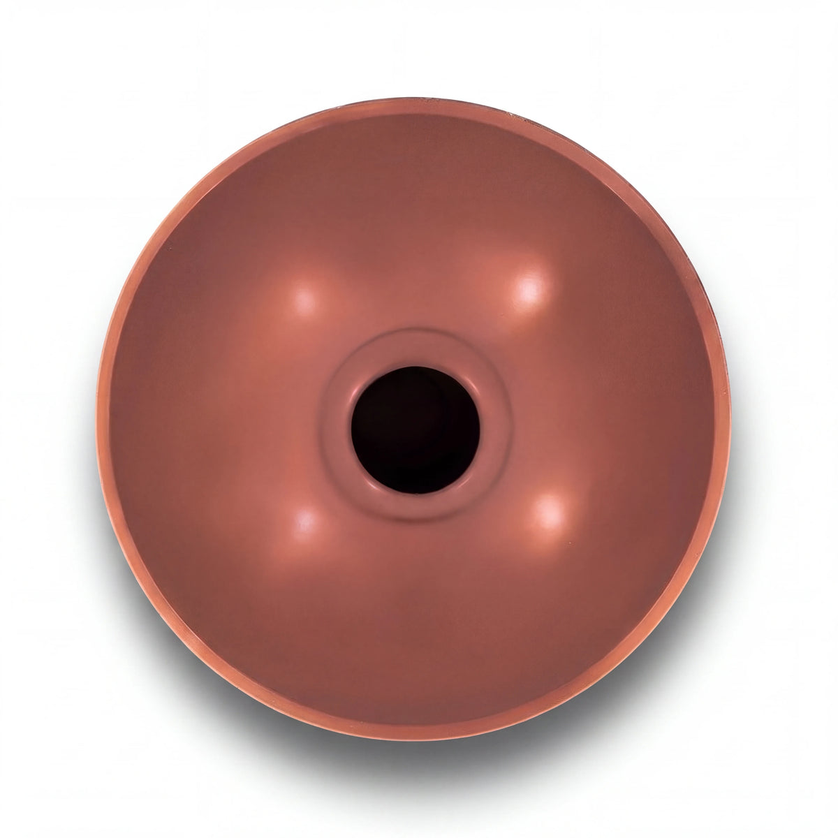 Dessous du handpan ROSALIE cuivré rosé : ouverture centrale (Gu) – Kovapan